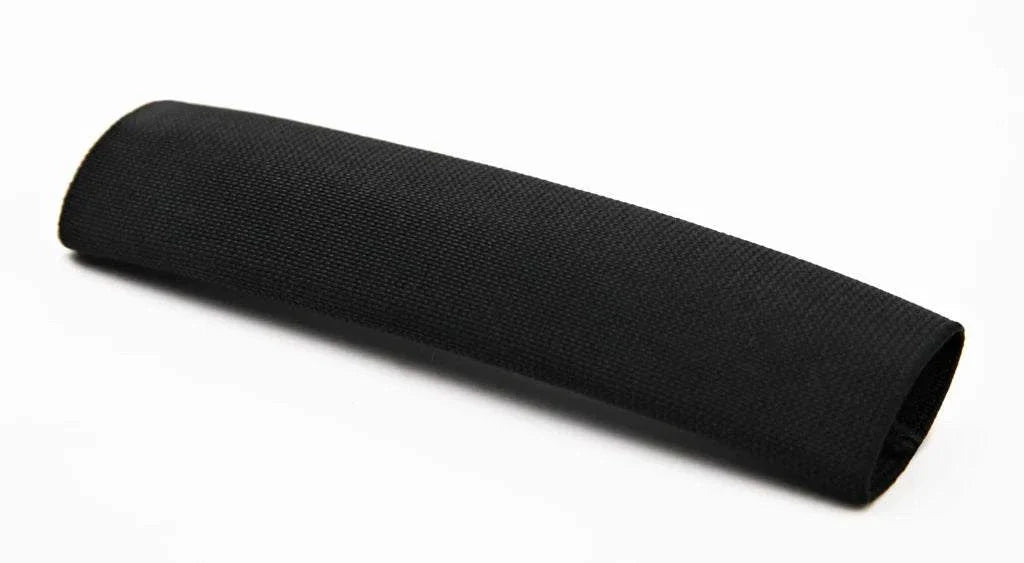 Close-up of black belt protector sleeve showing heavy-duty stretch material