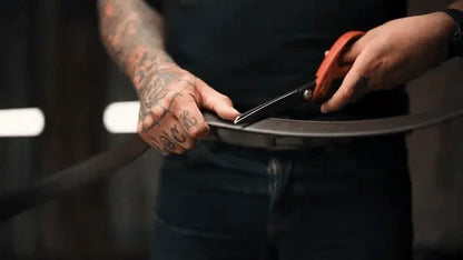 Close-up of X3 leather gun belt buckle and top grain leather texture