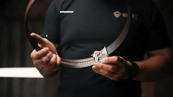 Side view of X3 leather gun belt showing gunmetal buckle and reinforced design